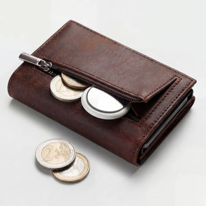 Full-grain vegetable tanned leather wallet with RFID blocking and popup card holder by Hot Trend Vault.