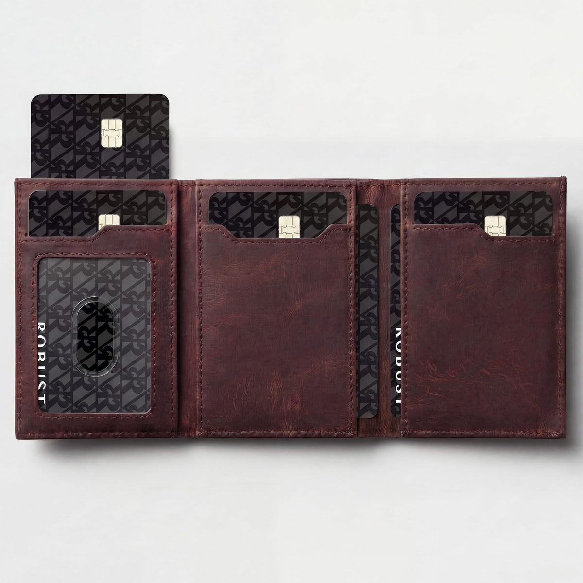 Full-grain vegetable-tanned leather wallet with RFID blocking and popup card feature, shown in a detailed close-up image.